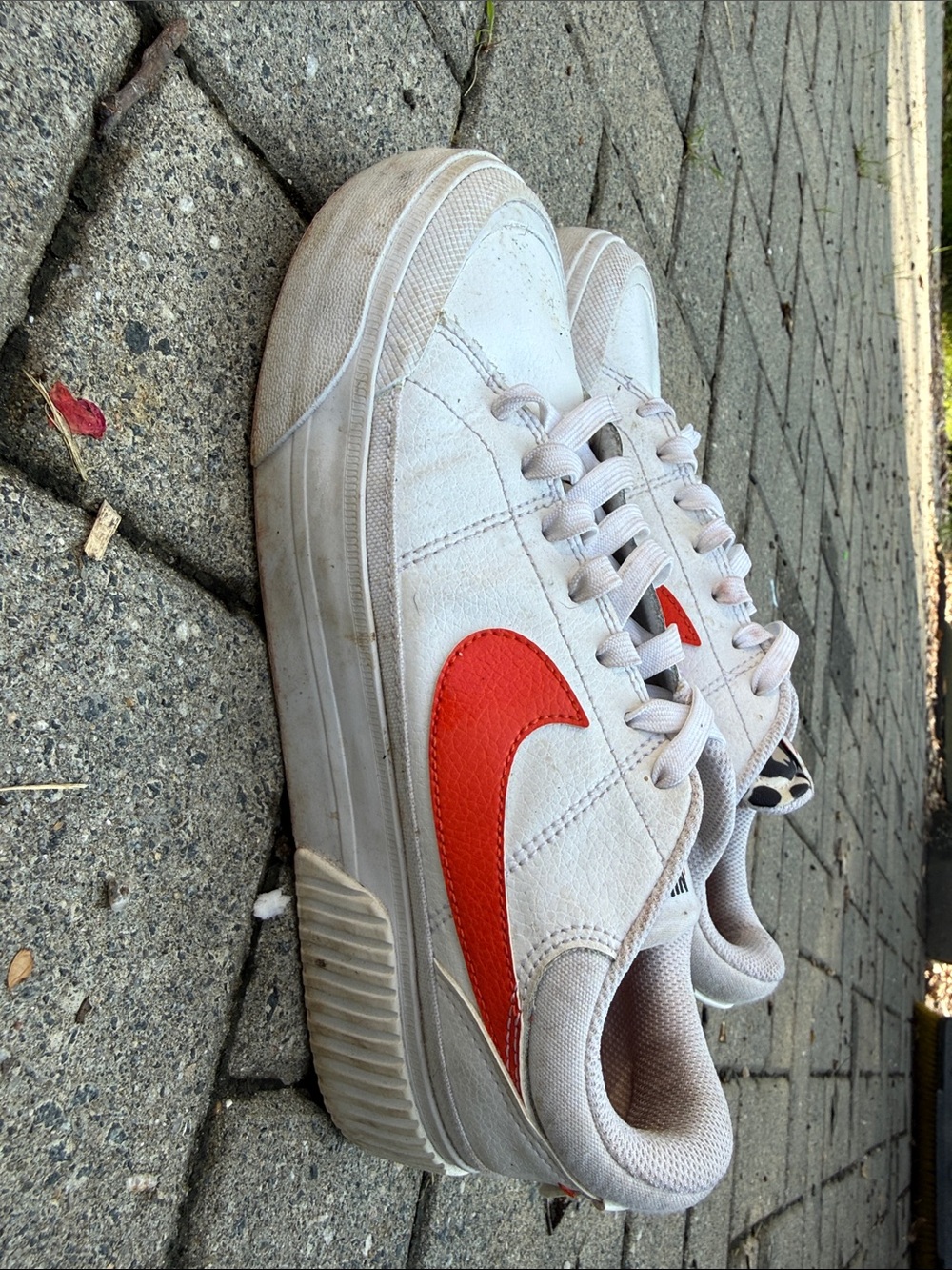 Nike women’s legacy lift platform sneaker. Leopard and red. Size 8
